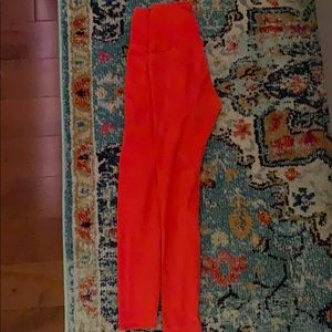 bright red spandex material leggings pocketed